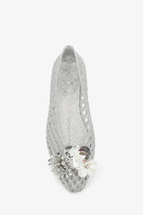 Heavenly Jelly women’s silver glitter PVC ballerina flat shoe with decorative floral embellishment at the toe