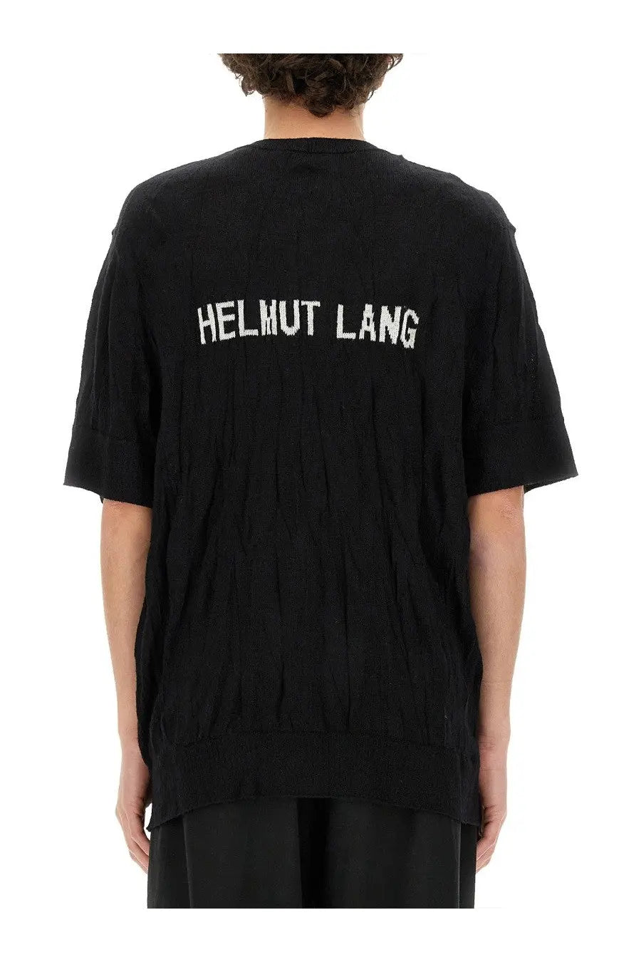 Back side of helmut lang men’s crushed black short-sleeved top with ribbed fabric and white embroidered branding