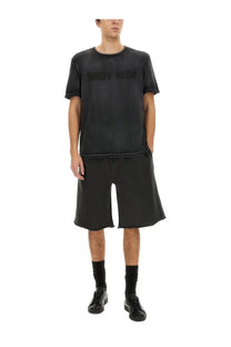 Helmut Lang men’s black garment dyed cotton t shirt with textured new york print on the chest