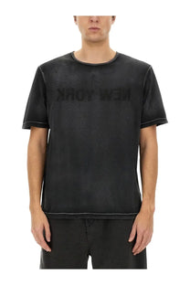 Helmut Lang men’s black distressed cotton t-shirt with garment dyed fabric and faded new york print across chest