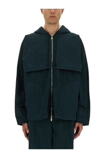 Dark green hooded windbreaker jacket by helmut lang with central zipper and two large flap pockets for men