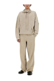 Beige helmut lang men’s hooded sweatshirt with front zipper and drawstring paired with matching wide-leg jogging pants gray