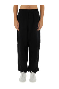Helmut Lang men’s New York pants in black loose-fitting sweatpants with ribbed elastic waistband and frayed hem