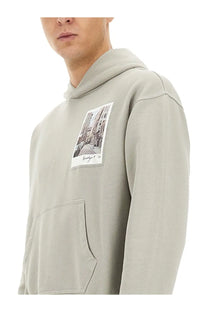 Helmut Lang men’s gray soft hooded sweatshirt with a rectangular urban street scene photographic patch on chest