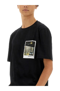 Helmut Lang men’s black cotton t-shirt with rectangular framed urban street scene print featuring yellow taxis