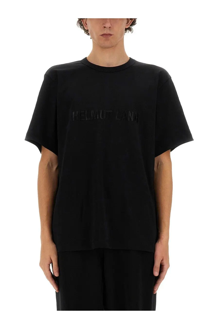 Black helmut lang men’s t-shirt with a subtle embossed logo across the chest perfect for casual wear