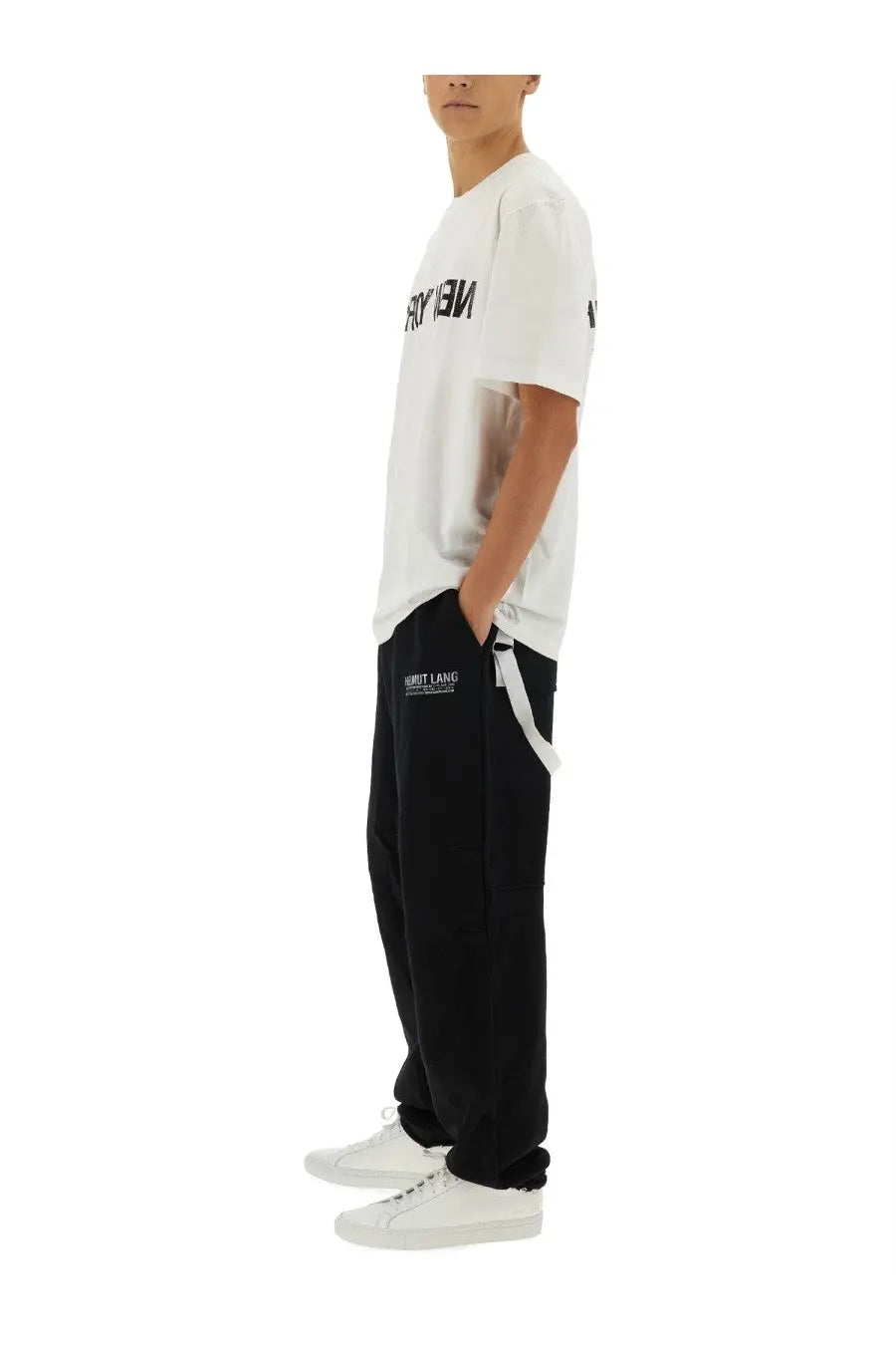 Black sweatpants with white drawstring and side pocket branding shown with helmut lang men’s white shirt