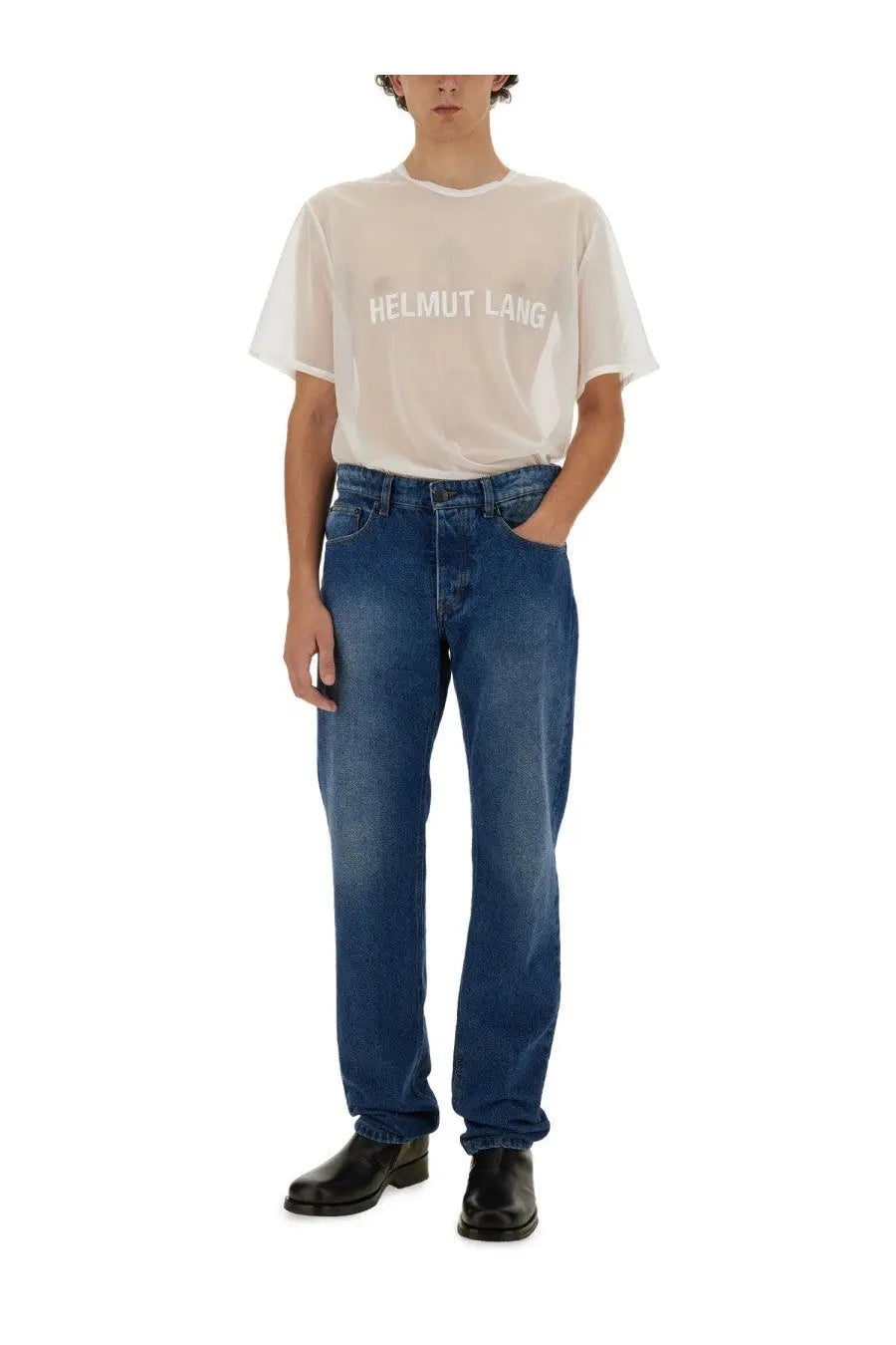 Blue denim jeans with classic five-pocket design and faded wash paired with helmut lang men’s white shirt