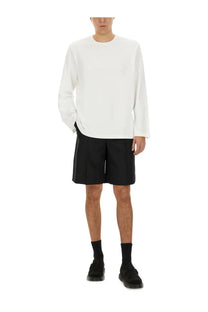 Helmut Lang men’s white long-sleeved crewneck sweater with subtle textured knit and minimalistic design
