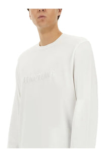 Helmut lang men’s white long-sleeved crewneck sweatshirt with subtle embossed tumultang lettering on chest