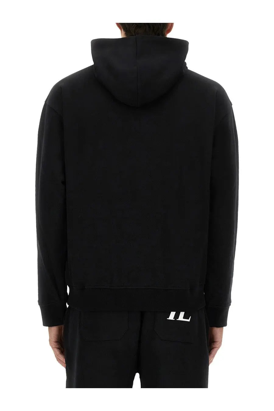 Back side of helmut lang men’s black hooded sweatshirt with minimalist white il logo on lower back