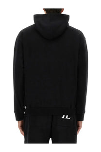Back side of helmut lang men’s black hooded sweatshirt with minimalist white il logo on lower back