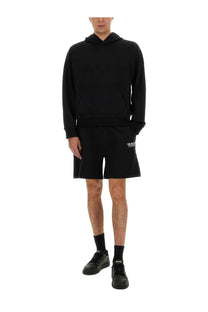 Helmut lang men’s black hooded sweatshirt with subtle white logo on left thigh in soft cotton blend material