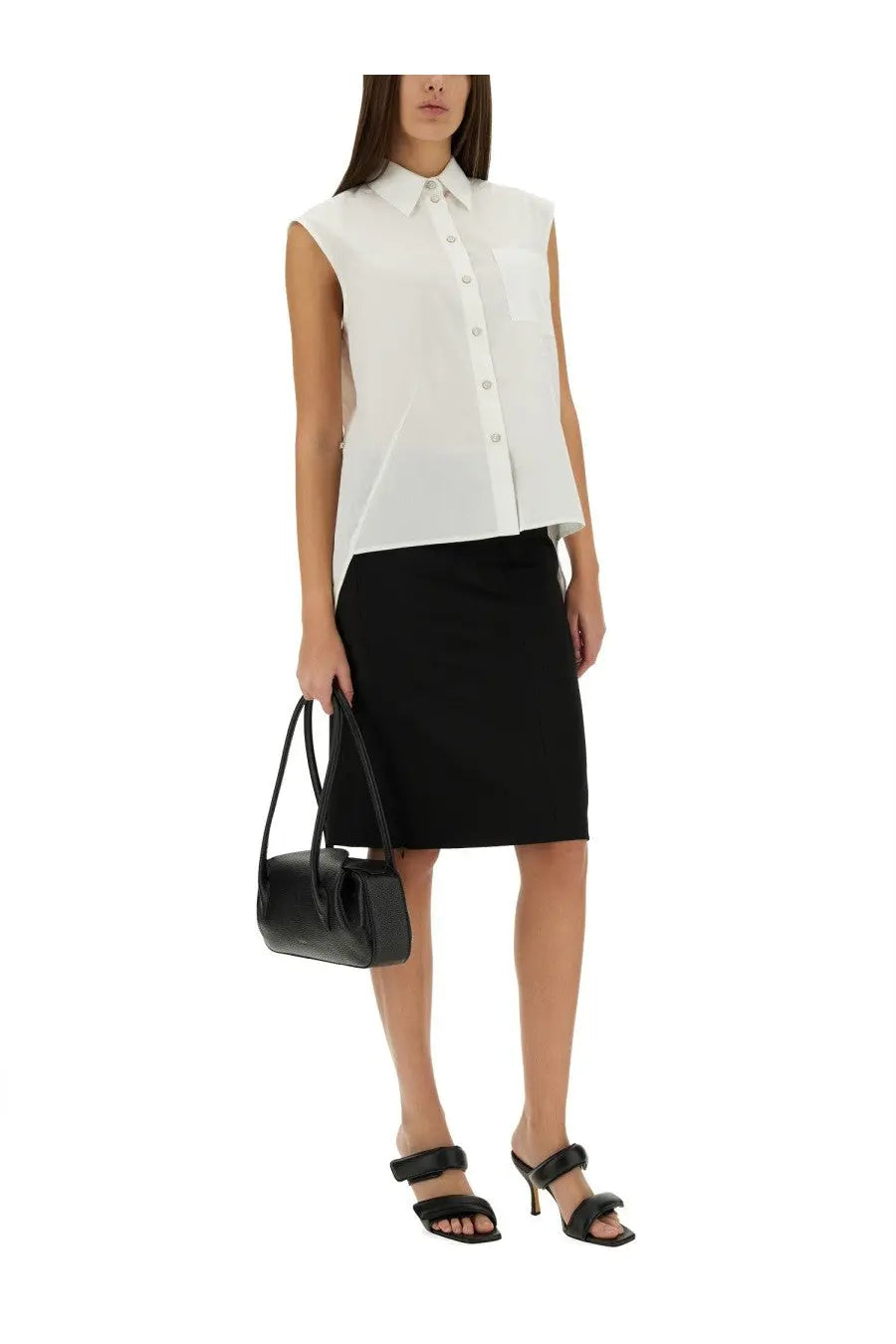 Black leather handbag with structured rectangular shape and top handles featured with helmut lang apex tail shirt white