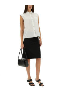 Black leather handbag with structured rectangular shape and top handles featured with helmut lang apex tail shirt white