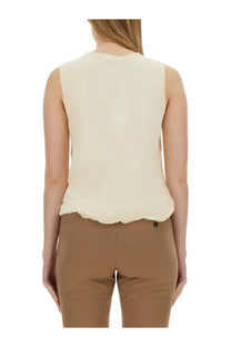 Cream-colored sleeveless Helmut Lang women’s jersey tank top with soft flowing fabric and scalloped hemline