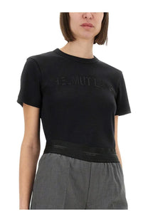 Helmut Lang women’s black short-sleeved crop top featuring a subtle embossed logo across the chest