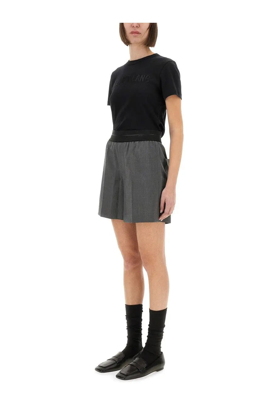 Helmut Lang women’s black short-sleeved t-shirt with subtle embossed logo and elastic waistband in soft fabric