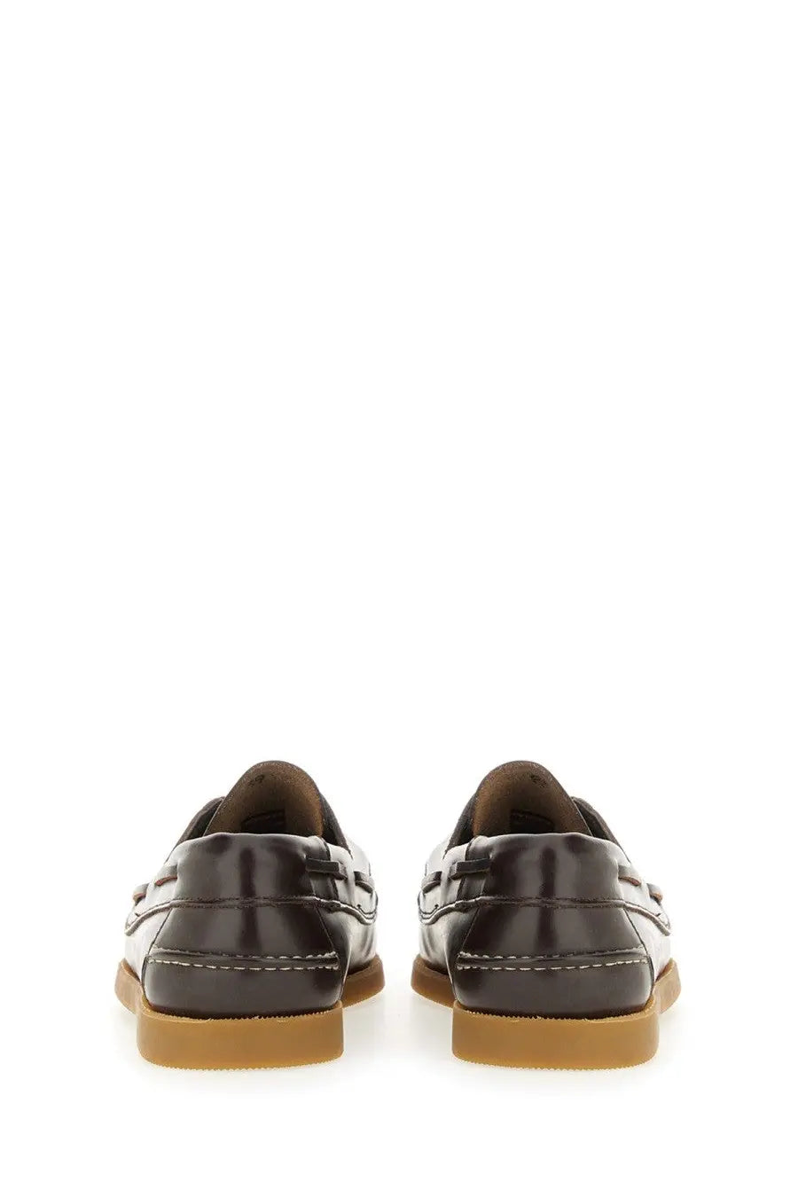 Black leather Hereu women’s boat moccasin with contrasting white stitching and tan rubber soles