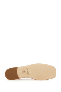 Hereu women’s dansa shoe blue showing beige leather sole with brown heel and hiddeu branding on the back side