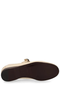 Beige leather hereu women’s moccasin alcover white with dark brown rubber sole and small bow detail at the back