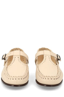 Hereu women’s moccasin alcover white cream leather t-strap moccasins with dark brown soles and decorative stitching