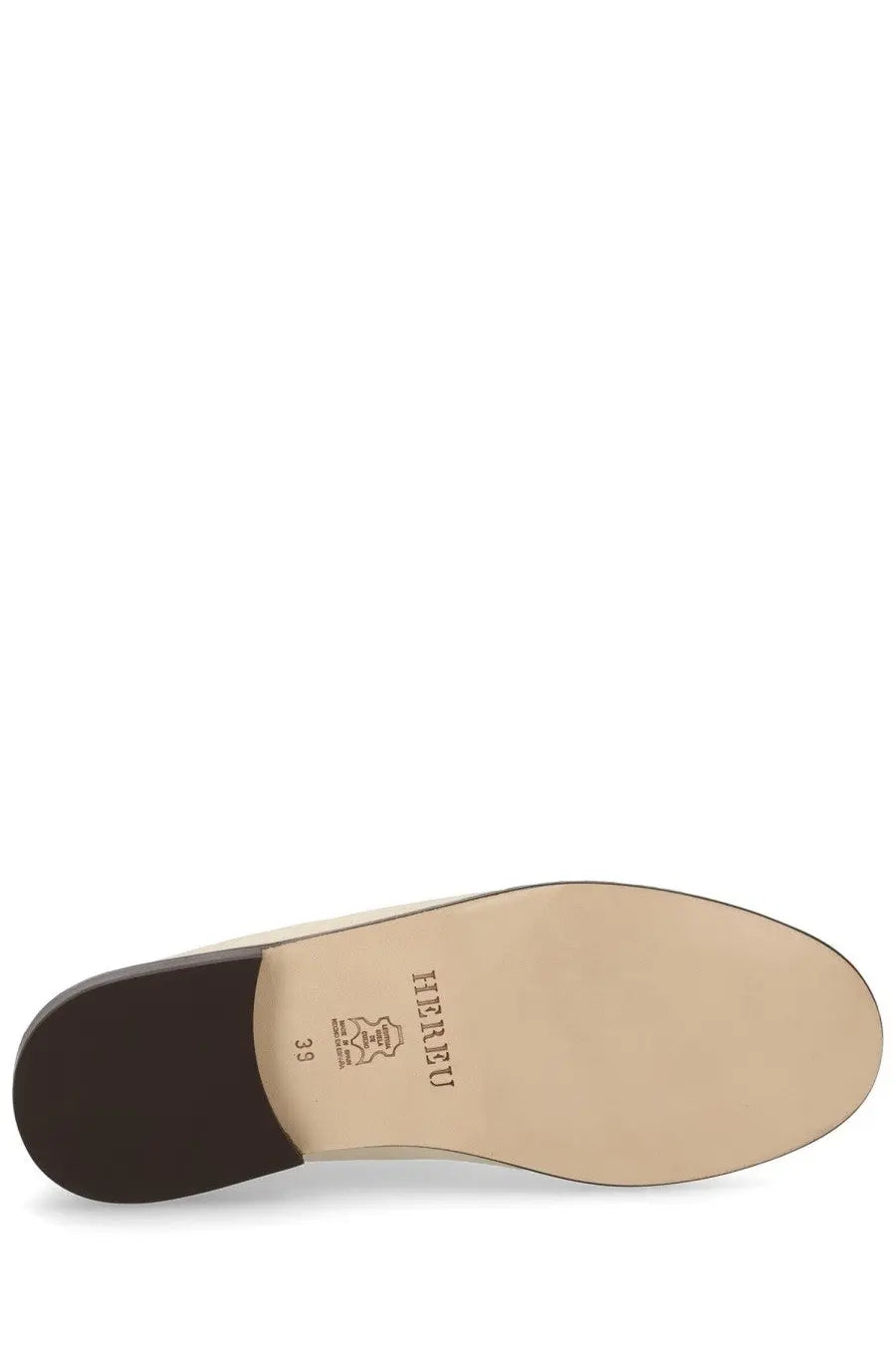Beige leather sole with dark brown heel and hermès branding on the back of hereu women’s moccasin juliol white