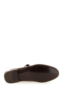 Brown leather loafer with polished finish and visible stitching along the sole in Hereu women’s moccasin mary jane Lorea supple shiny red