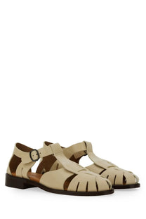 Hereu women’s peach beige leather sandals with t-strap design and cut-out detailing for stylish wear