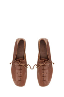 Hereu women’s brown leather lace-up loafers with minimalist design and subtle stitching details
