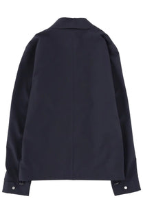 Black minimalist blazer with structured shoulders and buttoned cuffs in herno men’s overshirt blue product line