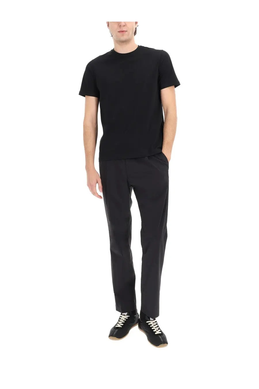 Black short-sleeved crew neck t-shirt displayed with herno men’s pants black for casual wear