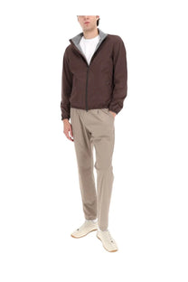 Brown zip-up jacket with gray inner lining and elastic cuffs shown with herno men’s grey pants