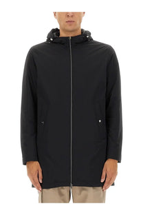Herno men’s parka resort black hooded trench coat with sleek minimalist design and subtle silver zipper accents