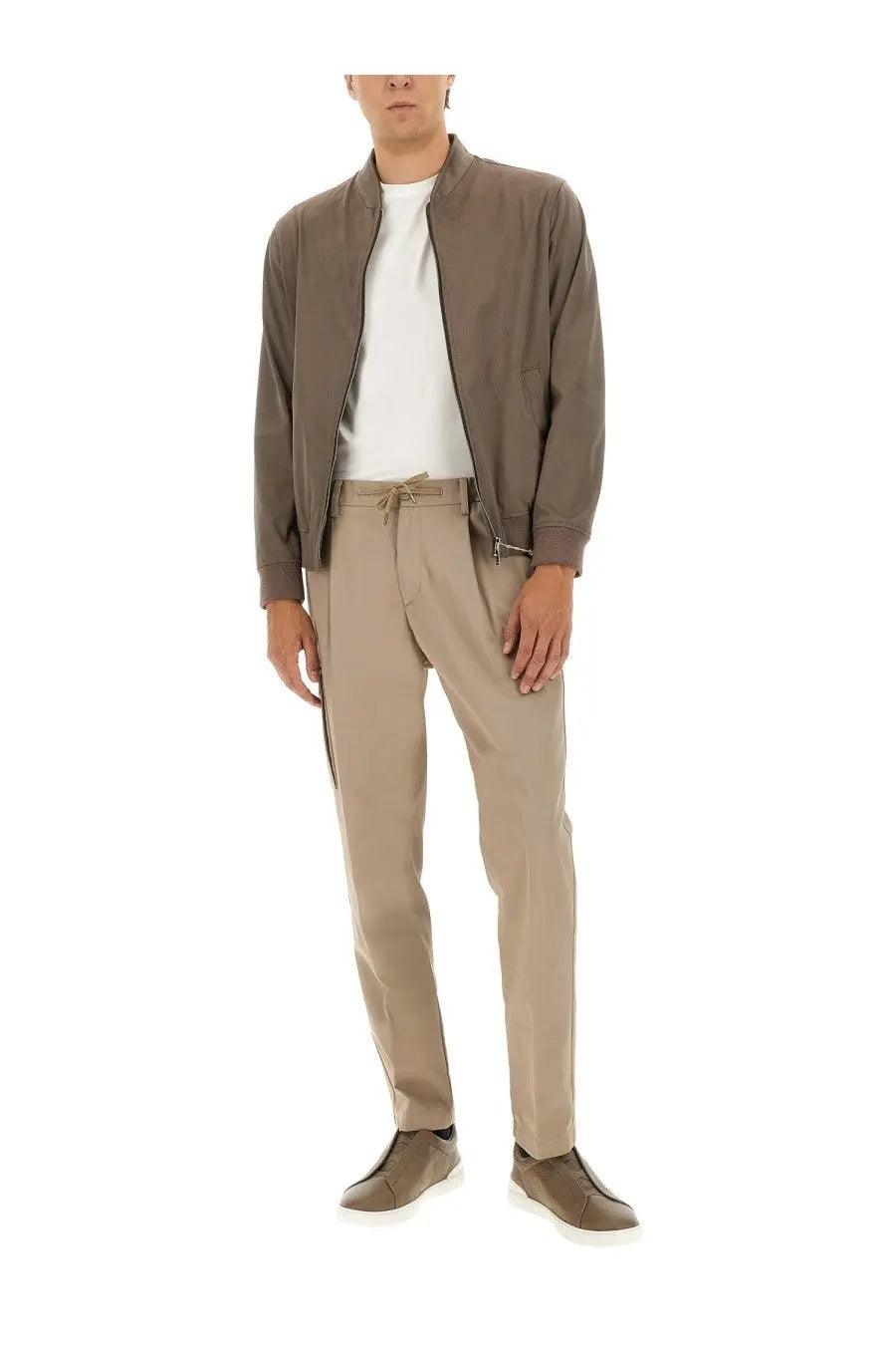 A sleek taupe brown herno men’s resort bomber jacket in suede alternative with subtle sheen and zippered pockets