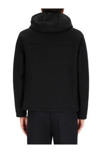 Herno men’s black hooded three layer jacket with sleek minimalist design and smooth water repellent fabric