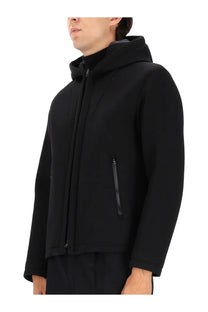Herno men’s black hooded three layer water repellent jacket with sleek modern design and subtle zipper details