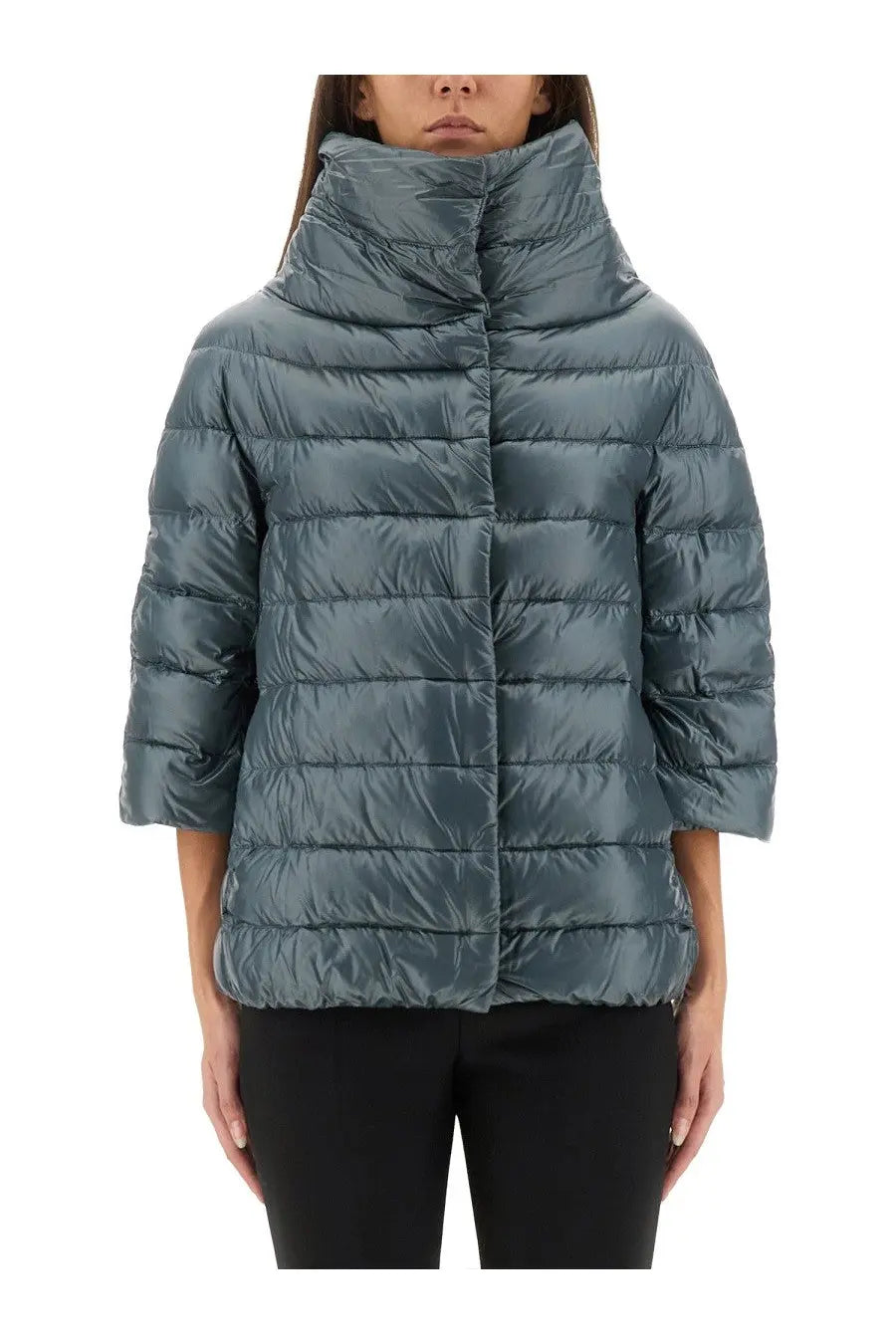 Herno women’s down jacket aminta blue is a sleek quilted puffer jacket in muted teal with a high collar and three-quarter sleeves