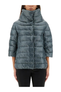 Herno women’s down jacket aminta blue is a sleek quilted puffer jacket in muted teal with a high collar and three-quarter sleeves