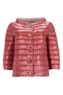 Herno women’s reversible padded coat in shiny rose-colored quilted puffer design with hood and silver buttons