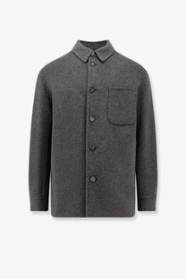Hevò men’s bari wool coat grey featuring a dark gray woolen button-up jacket with classic collar and front pocket
