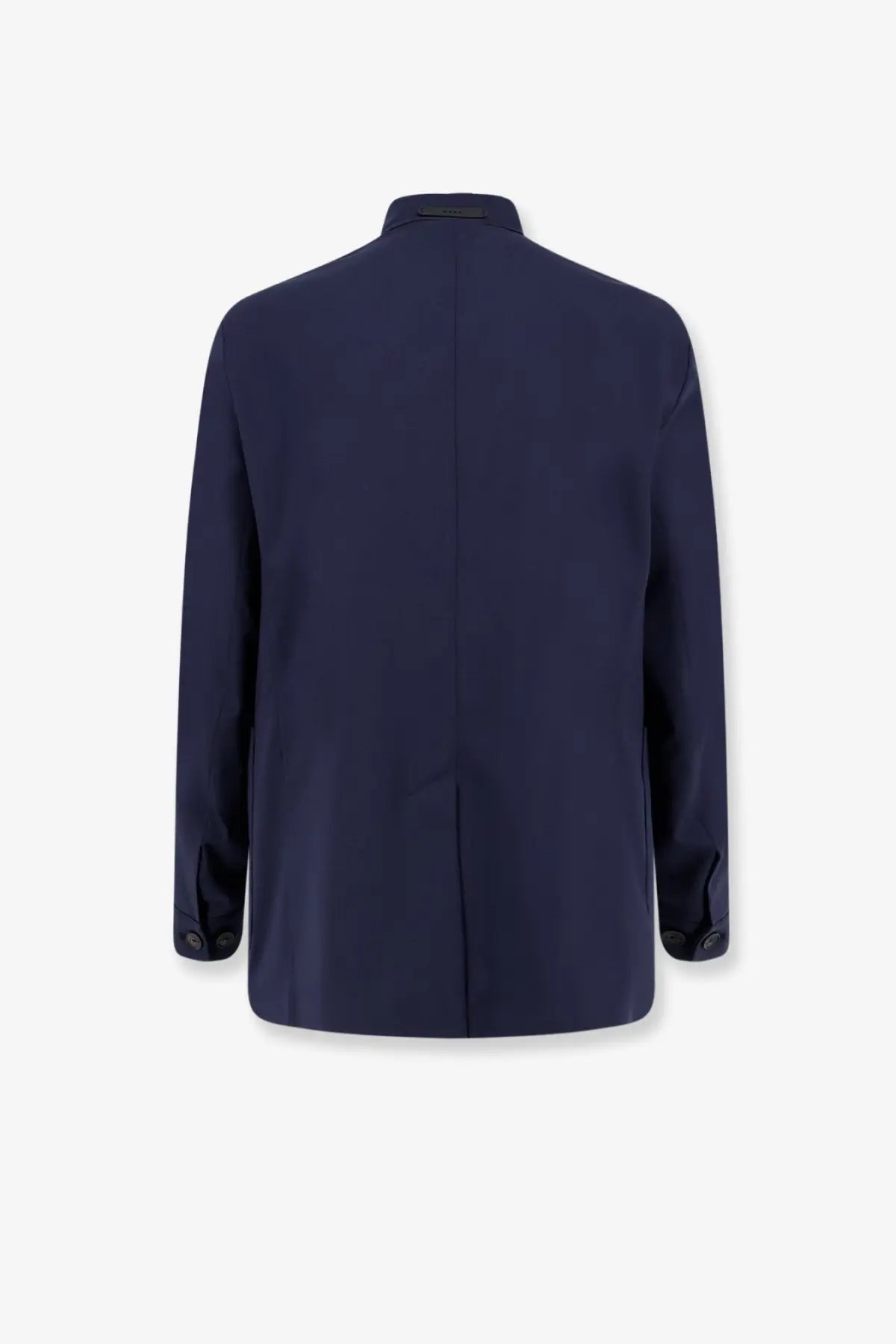 Navy blue tailored blazer with sleek modern cut and subtle seam detailing made from wool blend by hevò men