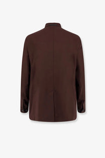 A sleek dark brown Hevò men’s Caslvecchio wool blend blazer with tailored fit and subtle stitching details