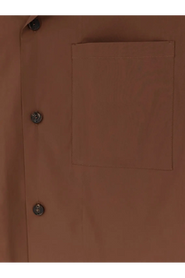 Hevò men’s cotton blend tan button-up shirt with a single chest pocket and metallic buttons