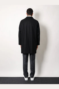 Black wool overcoat with classic double-breasted design and notched lapels hevò men’s loco virgin wool coat black