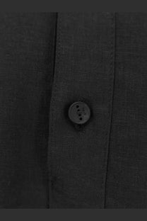 Dark gray hugo button on the textured fabric placket of hevò men’s montursi black linen and viscose shirt
