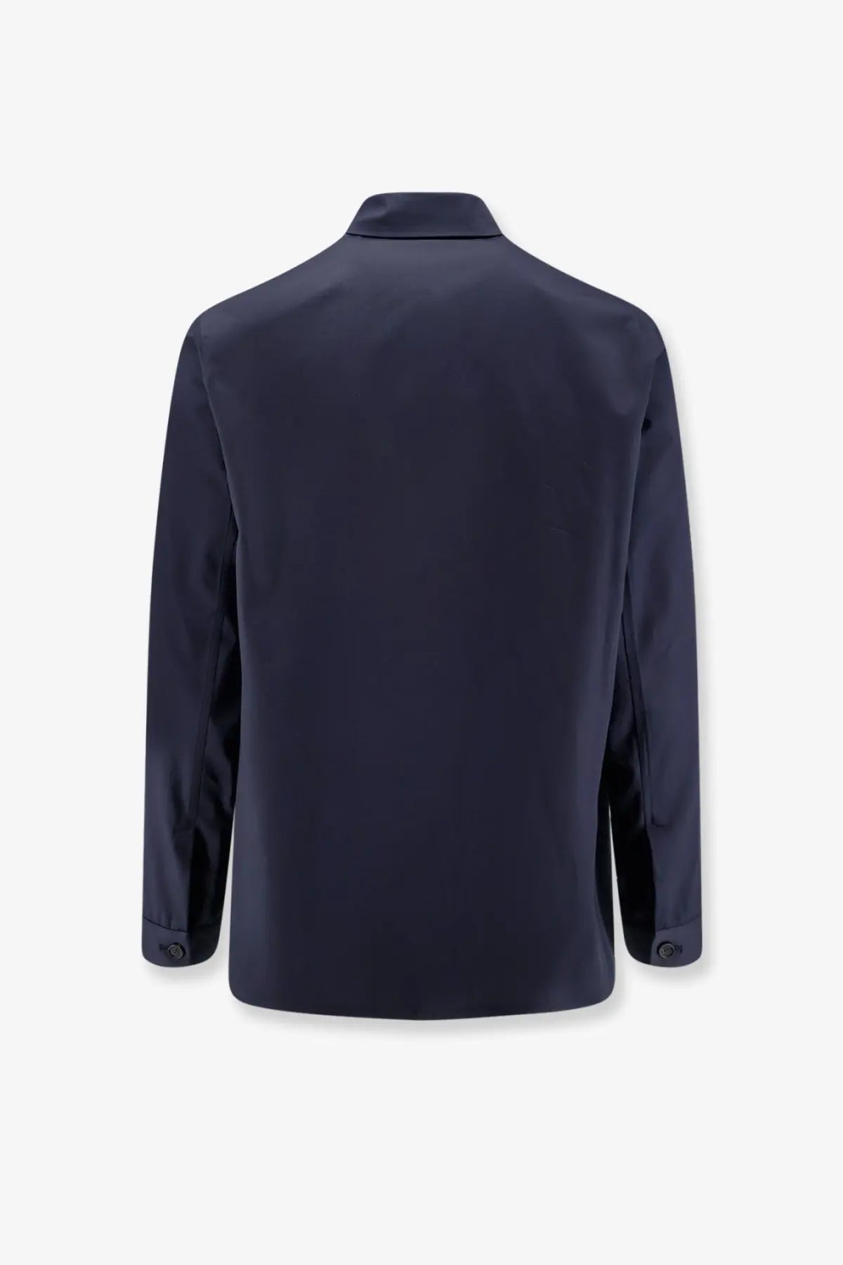 Dark navy blue men’s blazer with sleek modern design and subtle stitching paired with hevò men’s specchiolla cotton shirt blue