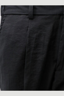 Hevò men’s torre canne black modal blend trousers with pleated front, tailored waistband, and subtle stitching details