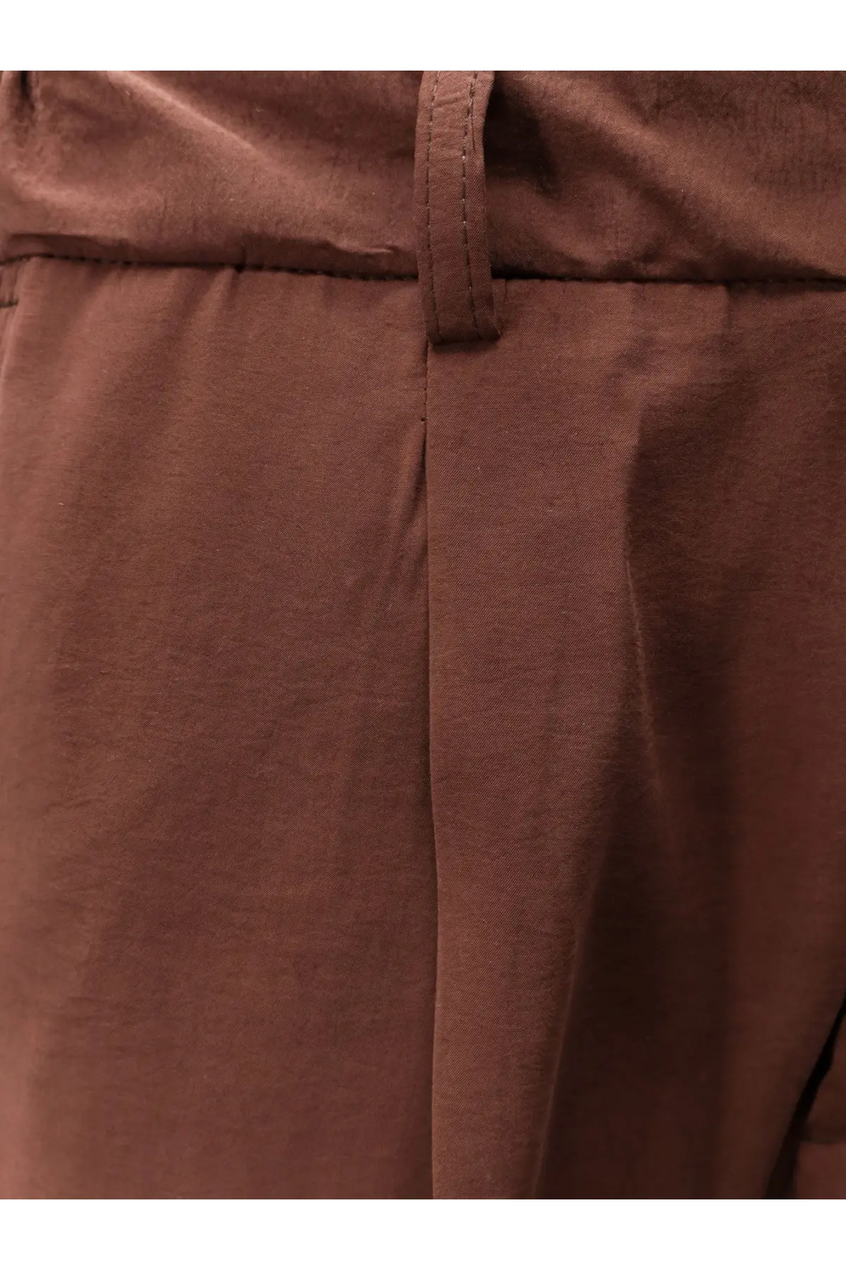 Brown woven modal blend Hevò men’s Torre Canne trousers with belt loop and stitched seams visible