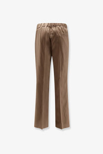 Brown satin like trousers with elastic waistband and subtle back pocket from hevò mens torre chianca linen viscose beige